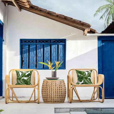 best affordable throw pillows with chair on patio